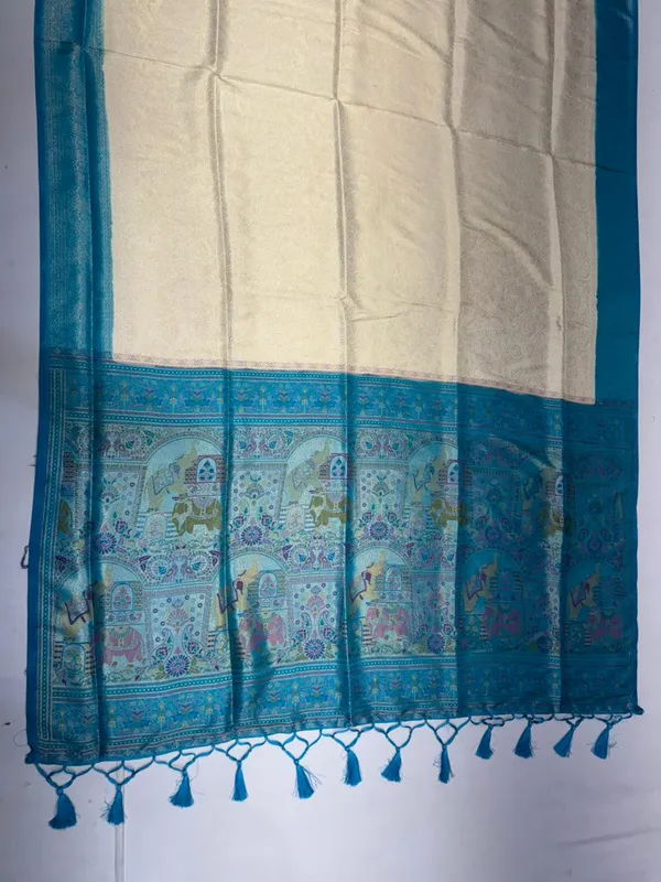 Off_White_And_Teal_Blue_Silk_Zari_Woven_Traditional_Saree_For_Women