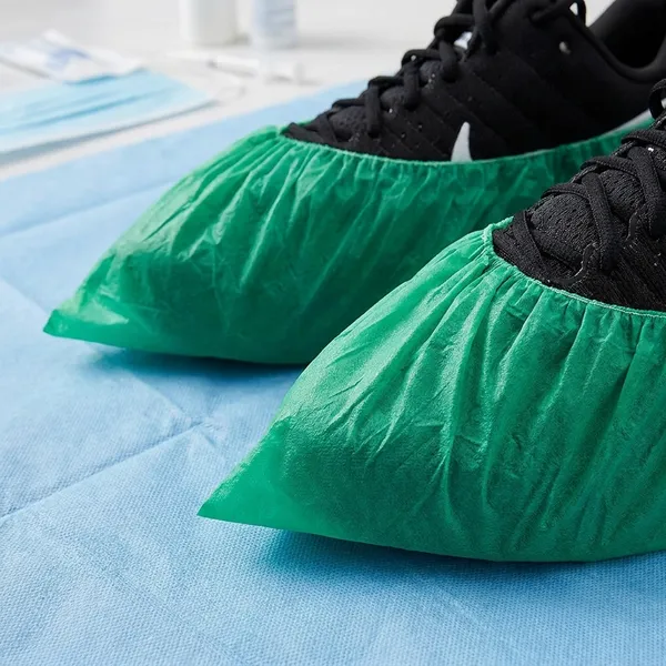 Kausta_Disposable_Shoe_Covers_Waterproof_Non_Slip_Durable_Shoe_Protectors_With_Elastic_Fit_One_Size_Fits_Most_For_Home_Hospital_Lab_Industrial_Use_50_Pcs_Red_Blue_Green_White_Black_Pack_Of_2