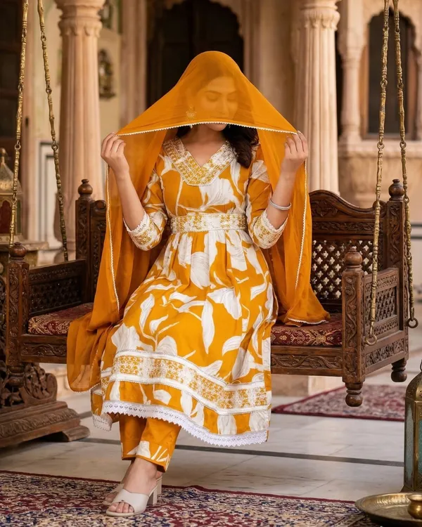 Womens_Mustard_Yellow_Floral_Printed_Rayon_Kurti_Pant_Dupatta_Set_With_Embroidered_V-Neck_And_Waist_Tie-Up_Detail