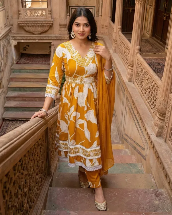 Womens_Mustard_Yellow_Floral_Printed_Rayon_Kurti_Pant_Dupatta_Set_With_Embroidered_V-Neck_And_Waist_Tie-Up_Detail