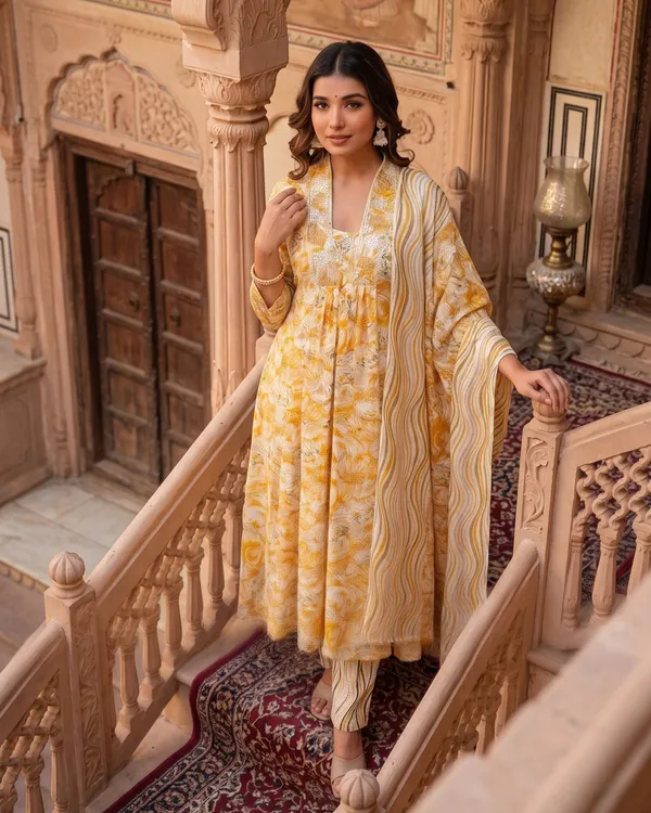Womens_Mustard_Yellow_Floral_Printed_Rayon_Kurti_Pant_Dupatta_Set_With_Embroidered_Round_Neck_And_Gathered_Flared_Style