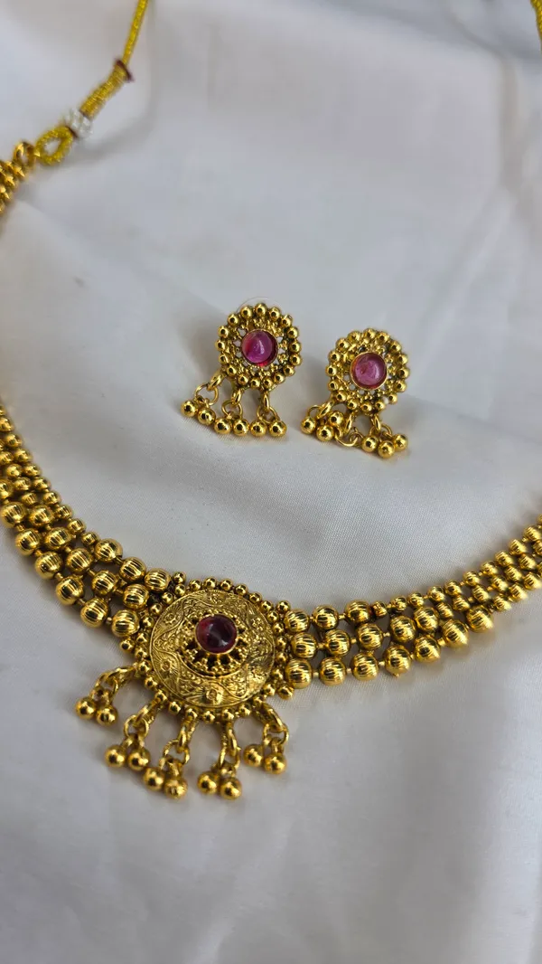 Golden_And_Pink_Brass_Necklace_Set_For_Women