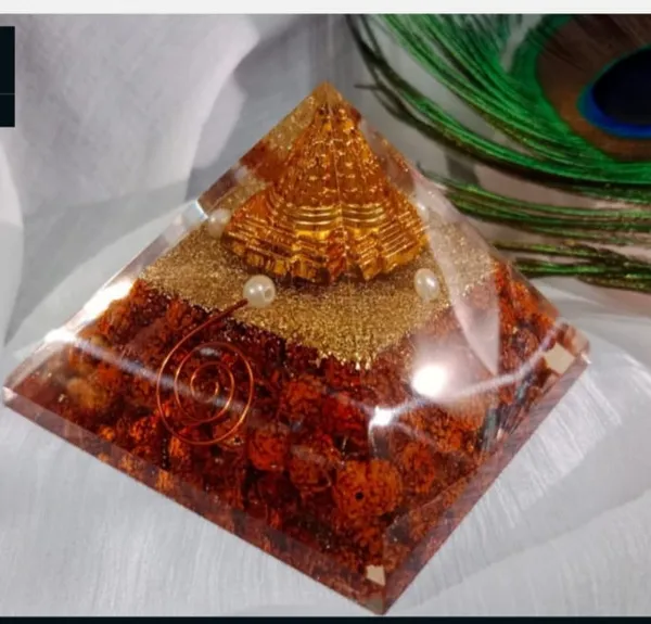 Handcrafted_Orgone_Energy_Pyramid_With_Carnelian_Stones_And_Sacred_Geometry_Design