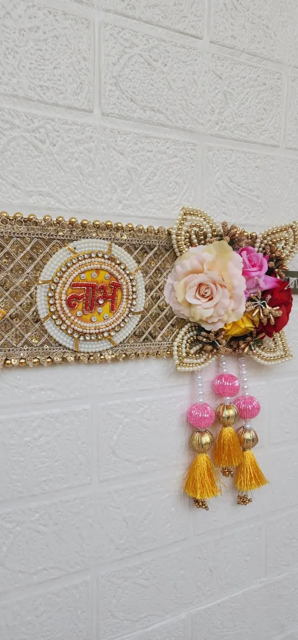 Decorative_Toran_With_Floral_Embellishments_And_Hanging_Tassels