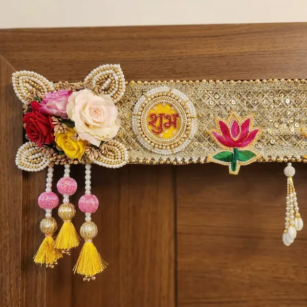 Decorative_Toran_With_Floral_Embellishments_And_Hanging_Tassels