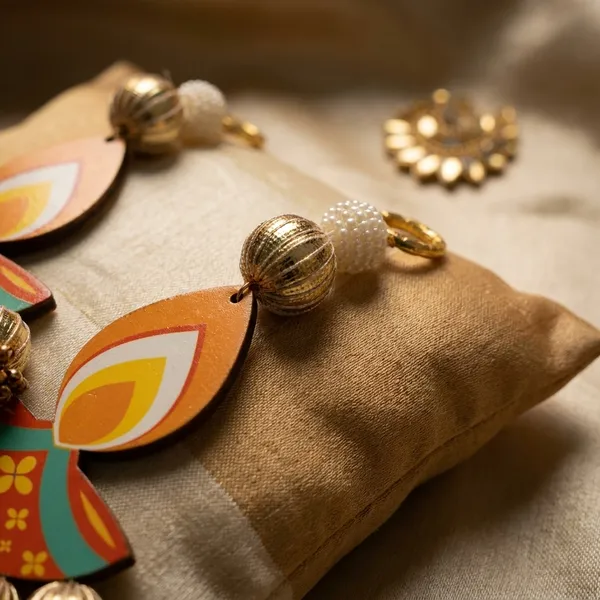 Traditional_Golden_Diya-Shaped_Hanging_With_Golden_Gota_Patti_Work_Set_Of_2