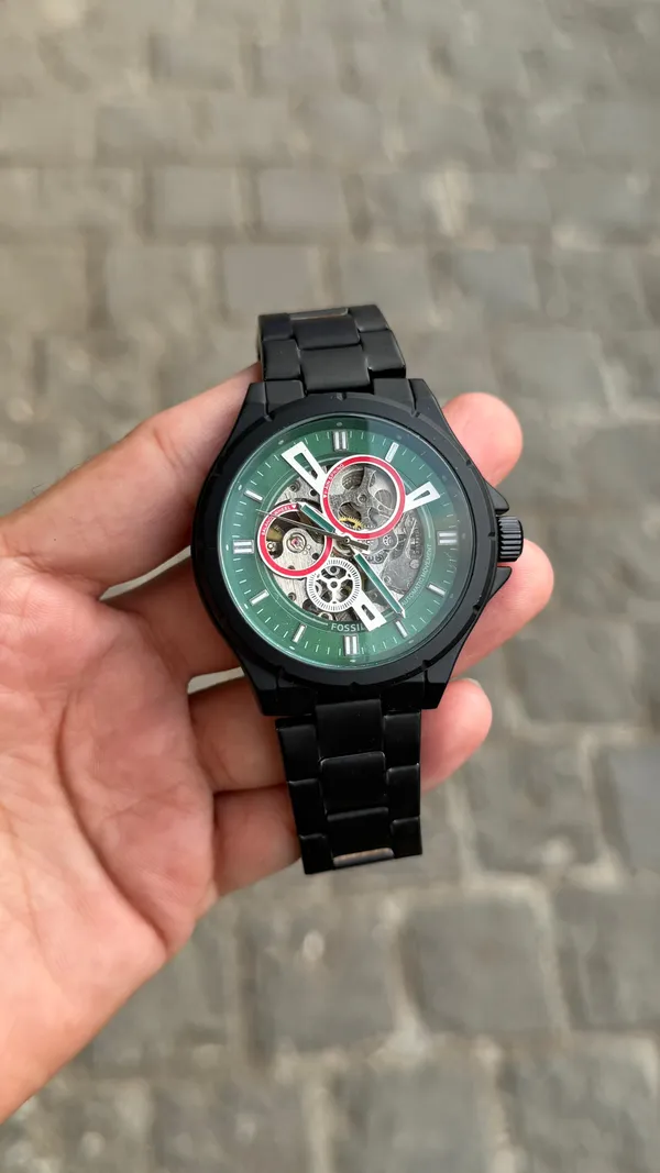 Automatic_Skeleton_Watch_With_Green_Dial_And_Black_Metal_Bracelet