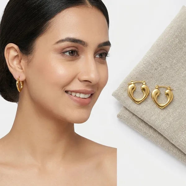 Gold_Toned_Heart_Shaped_Hoop_Earrings__(Available_in_B1G1)