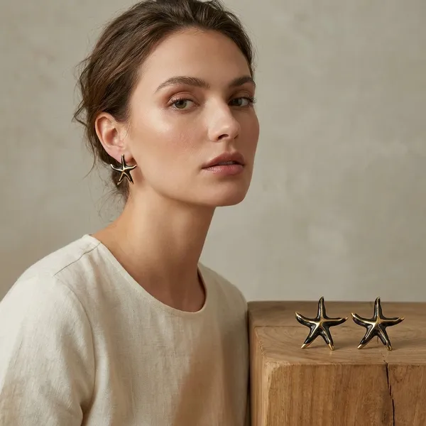 Golden_Starfish_Earrings_with_Black_Enamel