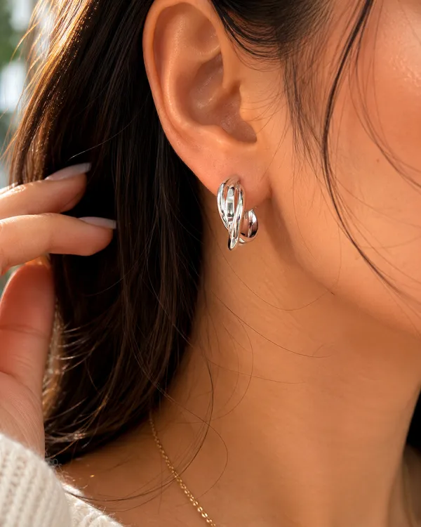 The_Intertwined_Ribbon_Huggie_Hoops_-_Made_With_925_Silver