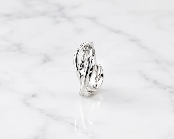 The_Intertwined_Ribbon_Huggie_Hoops_-_Made_With_925_Silver