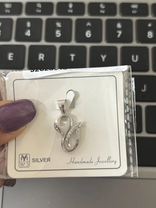 Serenade_Pink_Sapphire_&_Pavé_Swan_Charm_-_Made_With_925_Silver