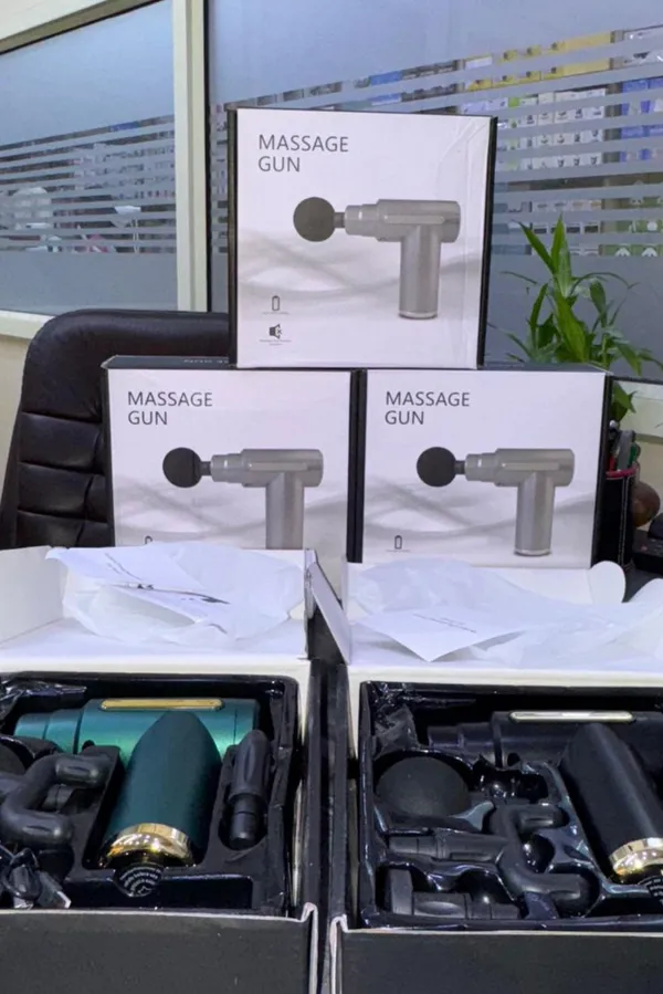 Professional_Percussion_Massage_Gun_With_Multiple_Attachments