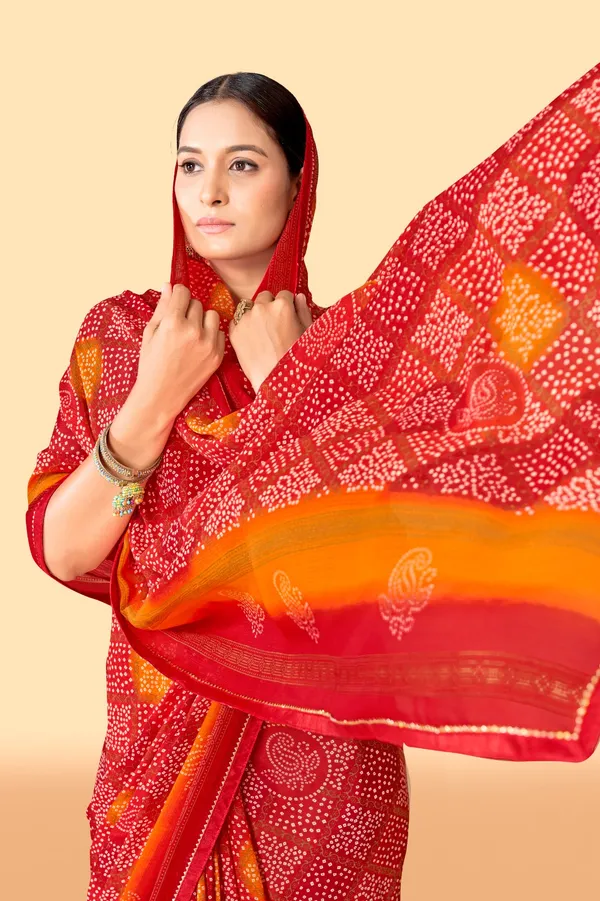 Red_And_Orange_Bandhani_Print_Saree_With_Golden_Border