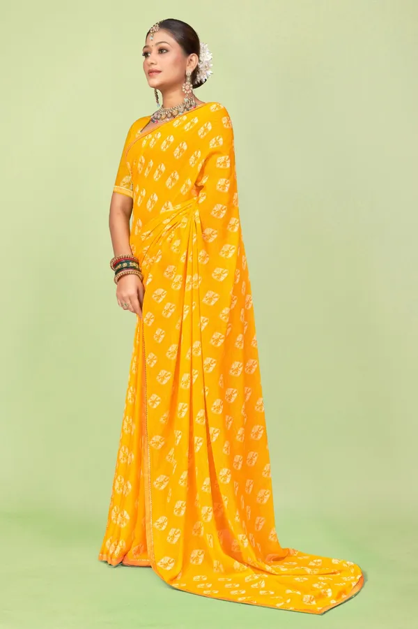 Yellow_Georgette_Saree_With_Bandhani_Print_And_Orange_Border