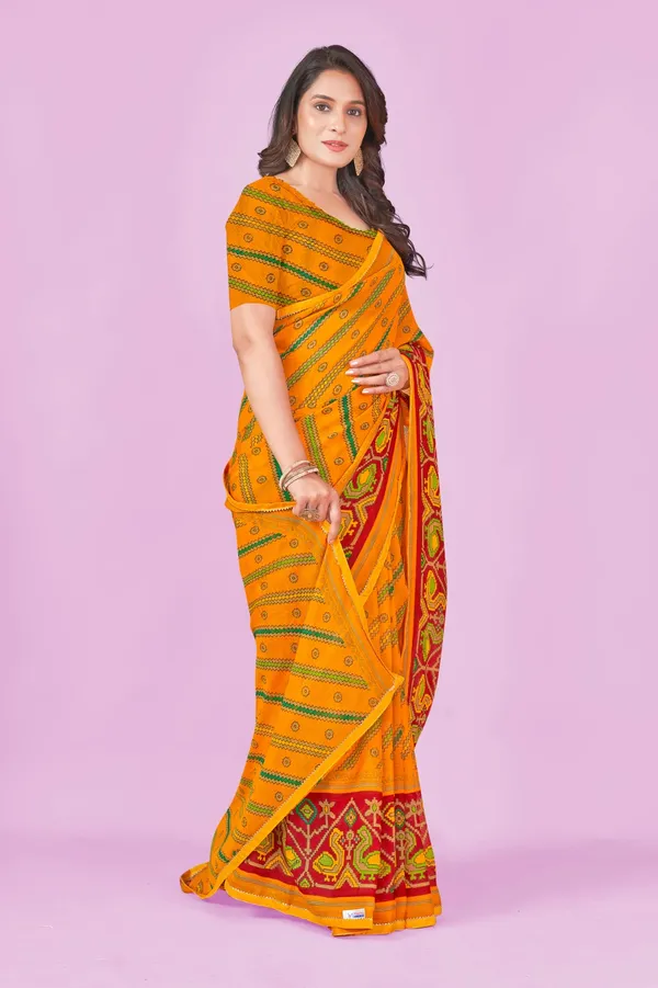 Traditional_Orange_Bandhani_Saree_With_Red_Border_And_Green_Motifs