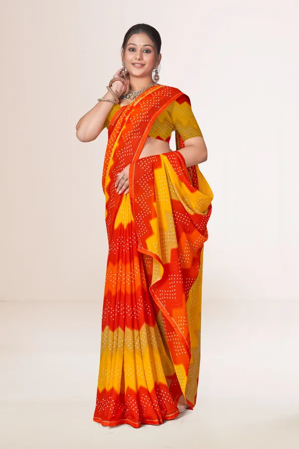 Traditional_Bandhani_Saree_In_Red,_Orange_And_Yellow_With_Golden_Border