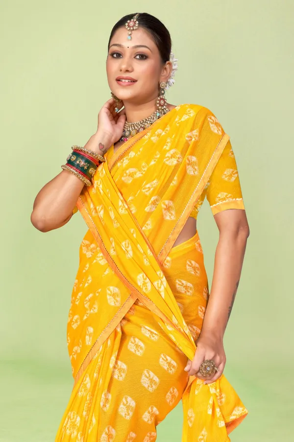 Yellow_Georgette_Saree_With_Bandhani_Print_And_Orange_Border