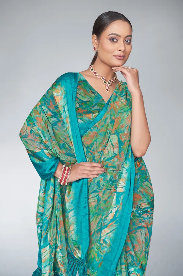 Turquoise_Green_Abstract_Print_Saree_With_Woven_Border_And_Tasseled_Pallu