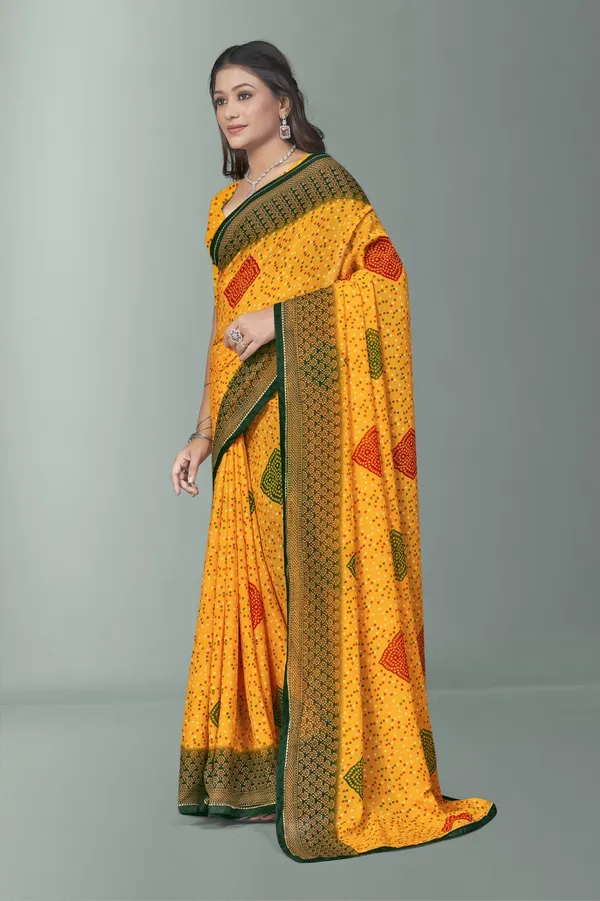 Yellow_Bandhani_Saree_With_Green_Border_And_Patchwork