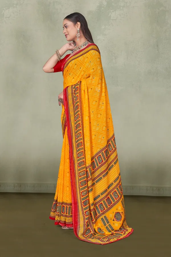 Yellow_Bandhani_Saree_With_Red_Border_And_Embroidered_Pallu