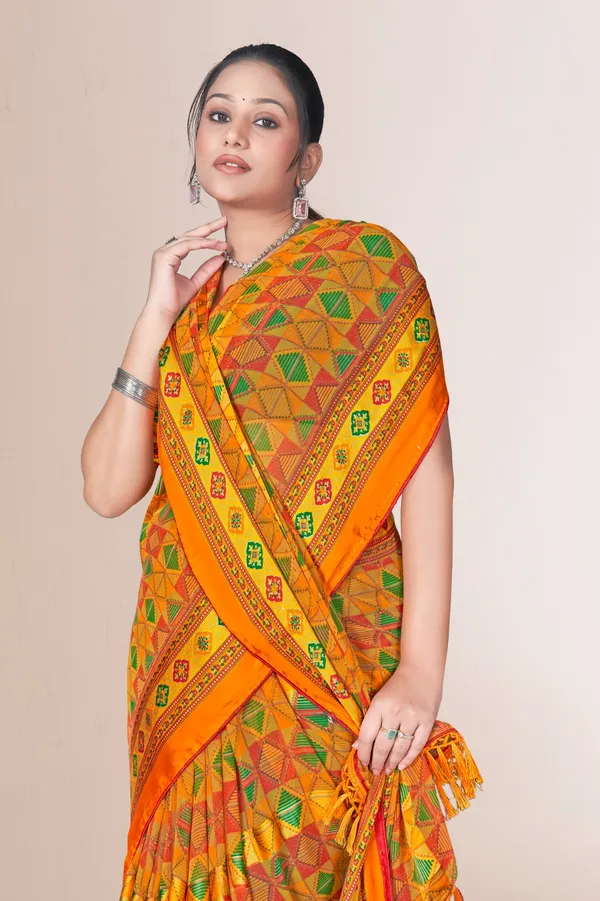 Orange_Traditional_Patola_Silk_Saree_With_Geometric_Pattern