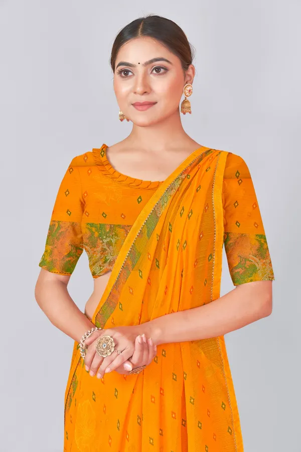 Vibrant_Orange_Saree_With_Green_Floral_Border_And_Embellished_Blouse