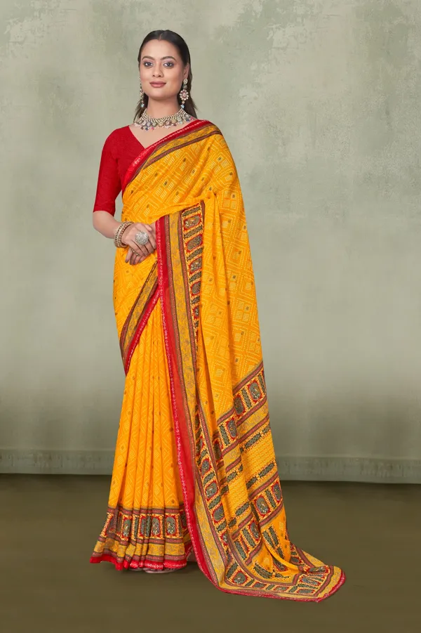 Yellow_Bandhani_Saree_With_Red_Border_And_Embroidered_Pallu