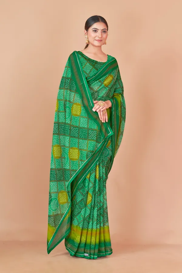 Green_Bandhani_Saree_With_Yellow_Accents_And_Traditional_Tie_Dye_Pattern