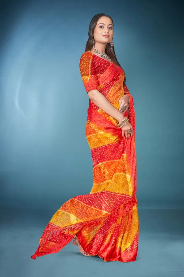 Vibrant_Bandhani_Silk_Saree_In_Red,_Orange,_And_Yellow_With_Matching_Blouse