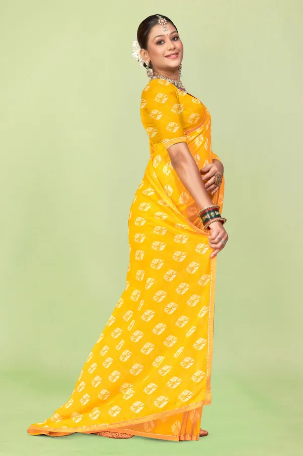 Yellow_Georgette_Saree_With_Bandhani_Print_And_Orange_Border