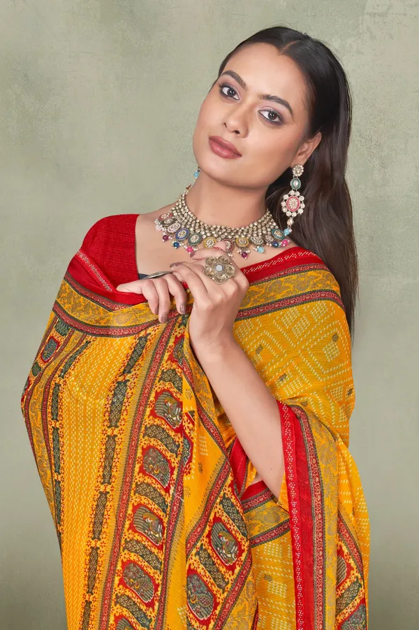 Yellow_Bandhani_Saree_With_Red_Border_And_Embroidered_Pallu