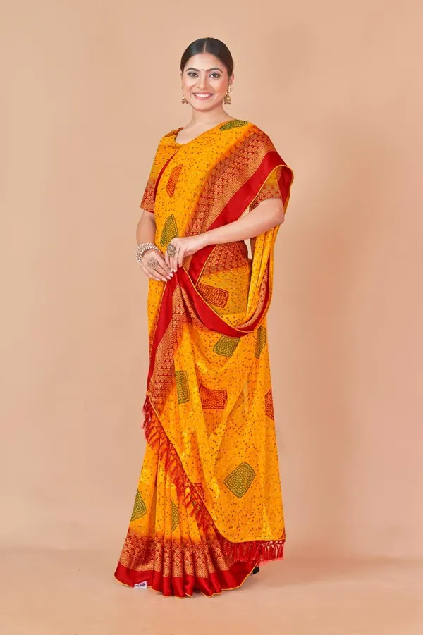 Yellow_Bandhani_Print_Saree_With_Red_Border