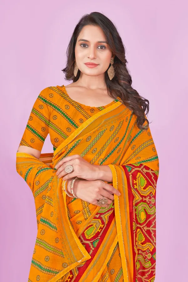 Traditional_Orange_Bandhani_Saree_With_Red_Border_And_Green_Motifs