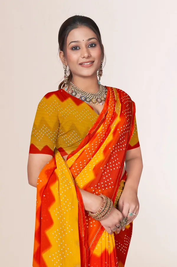 Traditional_Bandhani_Saree_In_Red,_Orange_And_Yellow_With_Golden_Border