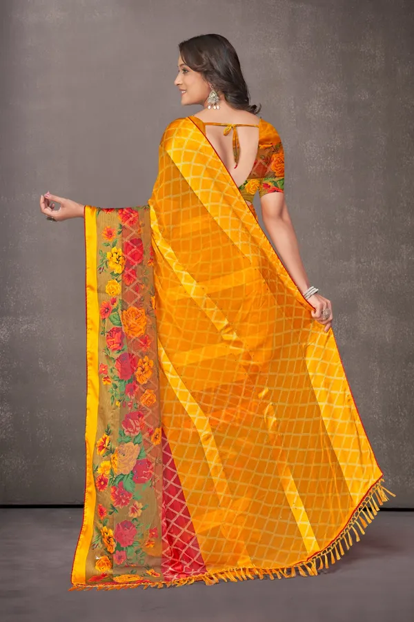 Yellow_Printed_Saree_With_Floral_Embroidered_Dupatta_And_Orange_Blouse