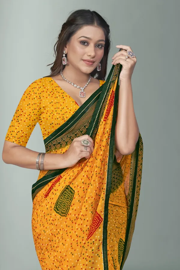 Yellow_Bandhani_Saree_With_Green_Border_And_Patchwork