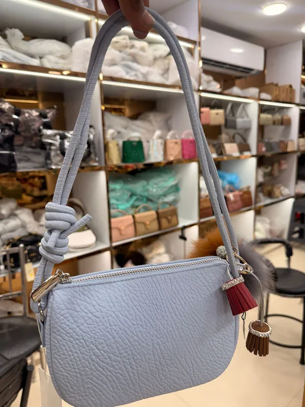 Grey_Mini_Crossbody_Bag_With_Tassel_And_Pom-Pom