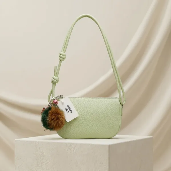 Green_Textured_Crossbody_Bag_With_Fur_Charm