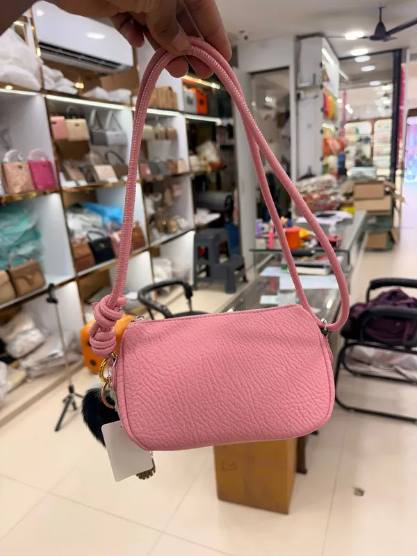 Pink_Textured_Crossbody_Bag_With_Adjustable_Strap