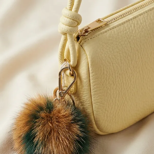 Beige_Handbag_With_Pom-Pom_Keychain