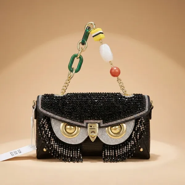 Black_Mini_Handbag_With_Logo_Clasp