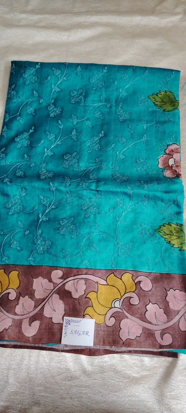 Turquoise_Embroidered_Pure_Handloom_Tussar_Saree_With_Floral_Kalamkari_Border