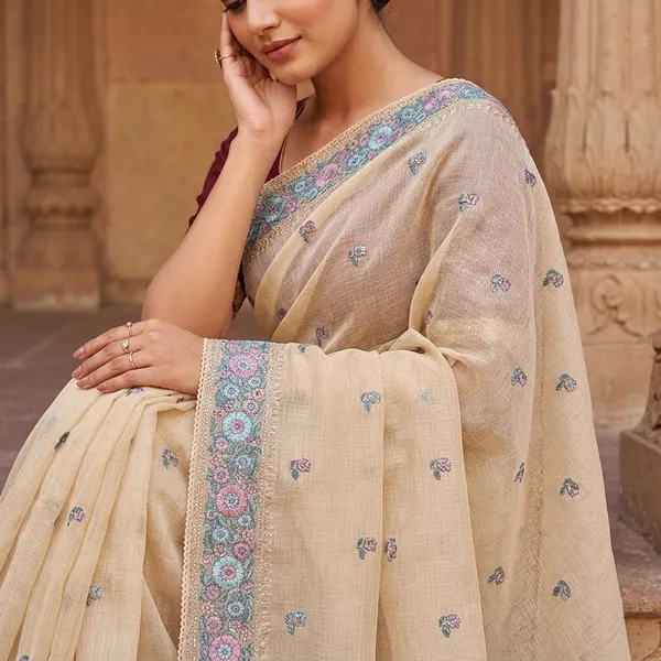 Elegant_Beige_Organza_Kota_Saree_With_Floral_Embroidery_And_Sequin_Border