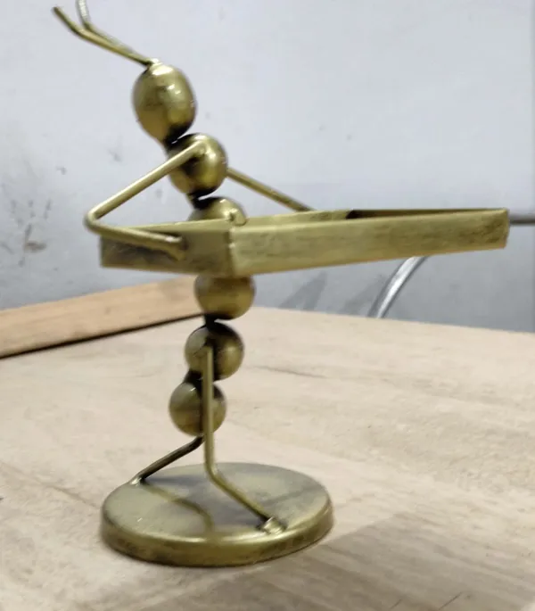 Brass_Metal_Figurine_-_Man_Balancing_On_Tightrope_Sculpture