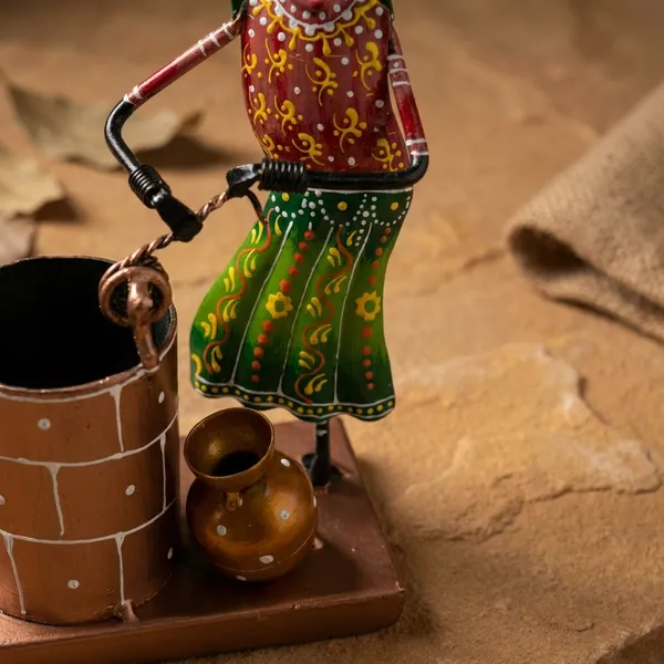 Decorative_Metal_Figurine_-_Woman_Churning_Butter