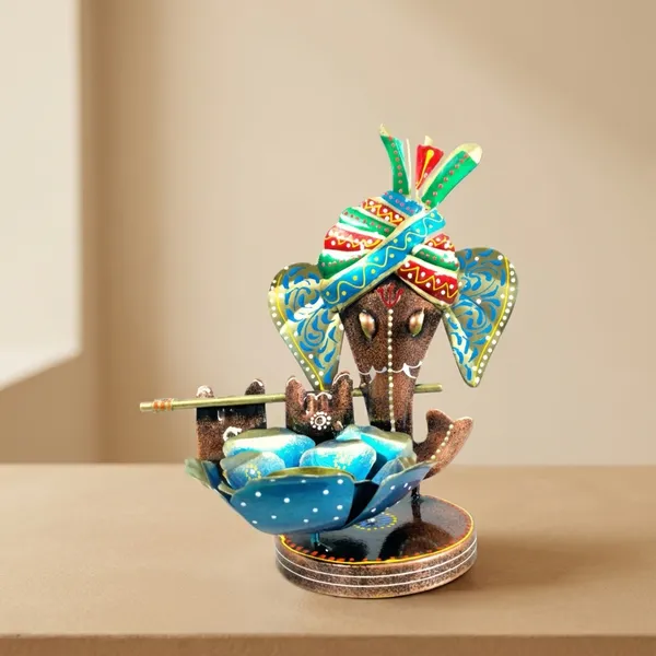 Decorative_Ganesha_Idol_With_Traditional_Attire_And_Flute