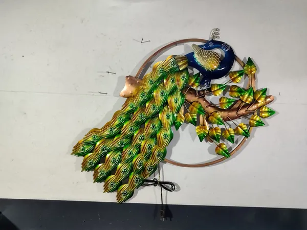 Decorative_Metal_Peacock_Wall_Hanging_With_Dual_Ring_Design