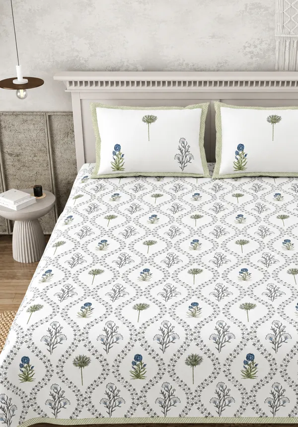 Elegant_Pure_Cotton_Bedsheet_with_delicate_floral_prints,_crafted_for_timeless_comfort_and_graceful_bedroom_styling_with__2_Pillow_Covers_(Super_King_Size(108*108))
