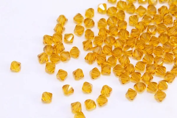 Genuine_Swarovski_Yellow_Transparent_Bicone_Crystal_Beads_|_4mm_|_36_Pcs